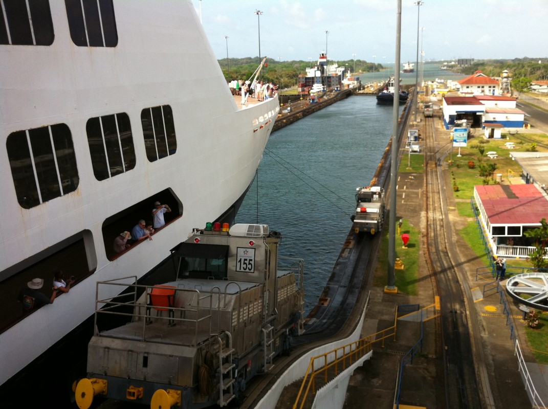 A perspective shot of the panama canal from a slightly elevated angle.